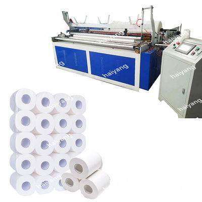 El PLC automático industrial controló el papel de papel higiénico del rollo que rajaba y máquina el rebobinar
